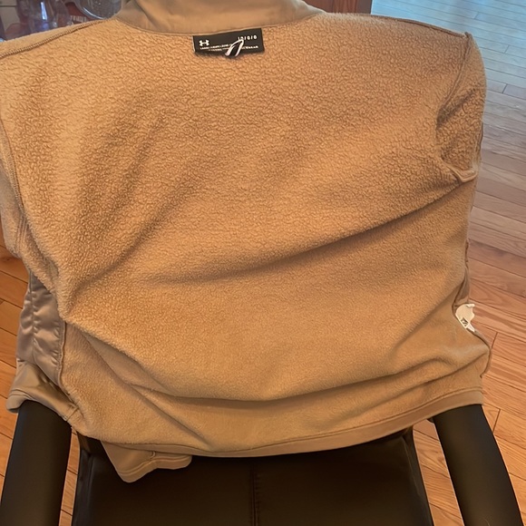 Under armor storm Jacket,, size large green exterior with a beige interior. - Picture 4 of 4